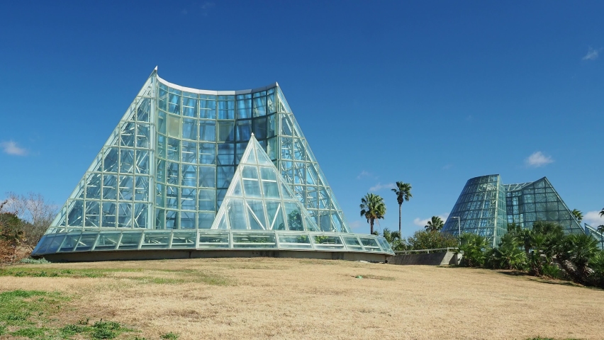 Sunny view of a green house in San Antonio Botanical Garden at Texas
