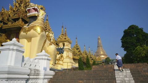 YANGON, MYANMAR - 2nd FEBRUARY, 2019: Tourists and local people in the Shwedagon Pagoda, Yangon, Myanmar, Asia