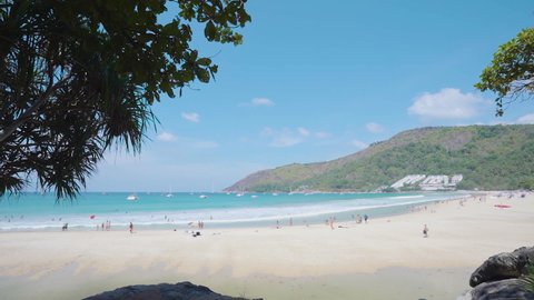 Landscape tropical sea mountain Phuket view point at Nai Harn popular Beach Located Phuket Province, Thailand. Scenic view people summer enjoying relax holiday vacation. white sand blue sky. Wide shot