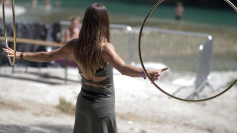 tolmin , Slovenia - 07 18 2018: Woman with hula hoop rings at Overjam Reggae festival
