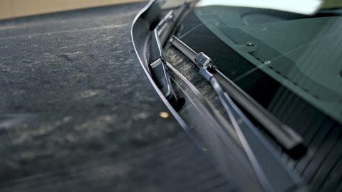 Сlose up of the hood of car with dirty dust spots after rain. Dirty car before washing. Carwash or Car Detailing process