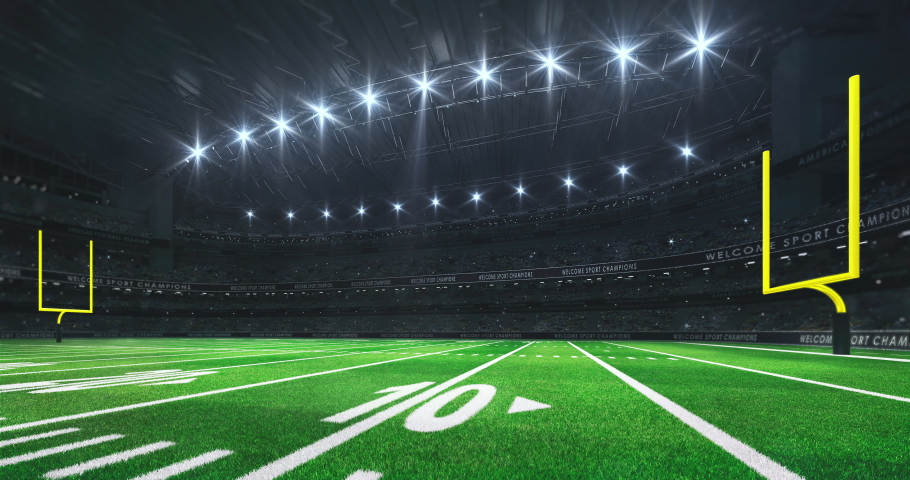 American football stadium with yellow goalposts, grass field and glowing spotlights and camera flashes. Sport advertisement 4K video loop.