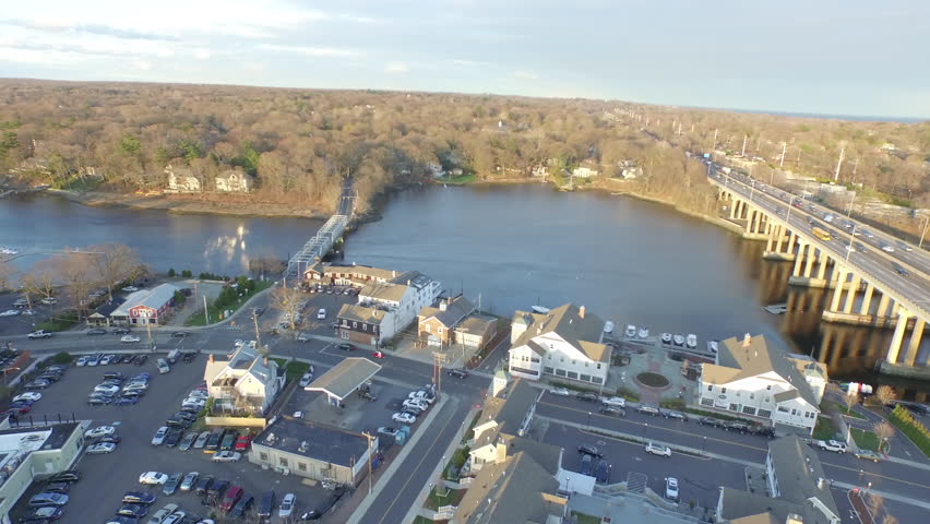 Flyover waterfront city during the day. Fairfield County, Connecticut. Shot in 4K UHD.