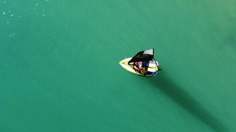 Phuket, Thailand, 27, January, 2022:
Top view of a man in a dinghy, a man is sailing in a dinghy