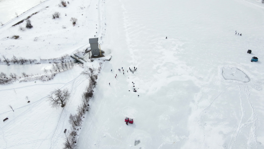 Ice hockey buddies get together at frozen Martindale Pond, Port Dalhousie, Ontario