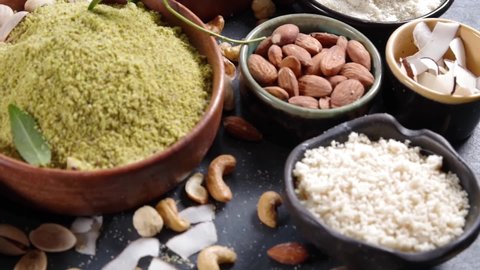 Alternative nut flour. Various keto paleo gluten, grain free flour source set, natural nut-based vegan baking. Almond, coconut, brazil nut, macadamia, walnut, cashew, pistachio, hazelnut, peanut flour
