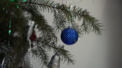 round blue ball on the Christmas tree. close-up
