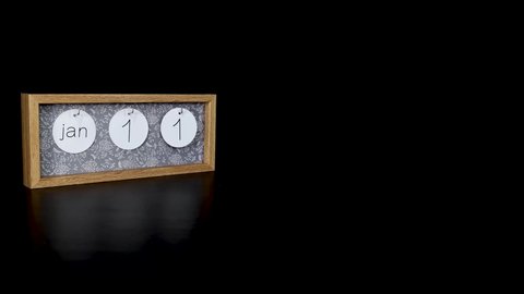 A wooden calendar block showing the date January 11th with a mans hand putting on and taking off the metal discs with the date and month on them, filmed in 8k quality 