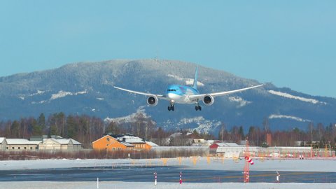 Oslo Airport Norway - February 6 2022: tui airways airplane boeing 787 arrival in distance