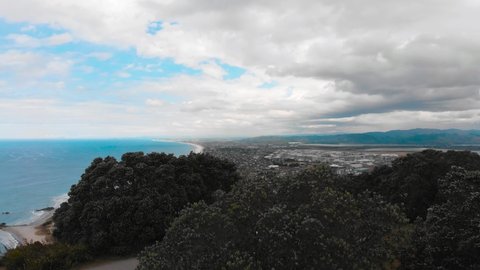 The panoramic view of Tauranga city from the Mount Maunganui summit, the drone footage. 
