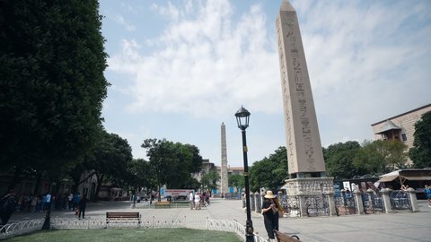Istanbul, Turkey - 15 May, 2021: Obelisk of Theodosius (Dikilitas) with hieroglyphs in Sultanahmet Square, Istanbul, Turkey. Ancient Egyptian obelisk in Istanbul City