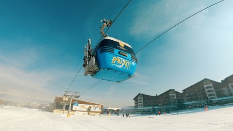Bansko, Bulgaria - 22 Jan, 2022: Cable Car Against The Blue Sky