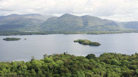 AERIAL - Mountains in Killarney National Park and Muckross Lake, Ireland, reverse