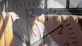 Animation of clock over african american woman in face mask using technology. global networks, business and connections during covid 19 pandemic concept digitally generated video. - Powered by Shutterstock - Get 15% off with code: PIKWIZARD15