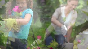 Video of blue lights over smiling caucasian girl and woman working in the garden. community garden week digitally generated video.