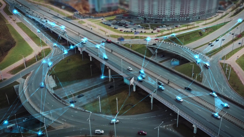 Futuristic smart traffic and control intelligent system. Vehicles are united in a common network. Autonomous self-driving cars moving along a city junction. Smart Roads, Ai Logistic, Traffic sensing | Shutterstock HD Video #1086752831