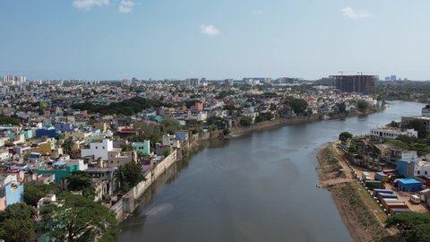Aerial Footage of Cooum River Going Through Chennai City. The River Is Black And Polluted. But Still People Live Around It.