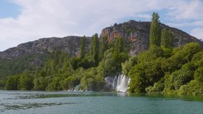 Skradinski buk the most unusual waterfall in Krka National Park. Location place Skradin resort (Lozovac), Croatia, Europe. Scenic footage of travel destination. Beauty of earth. Filmed in 4K video.