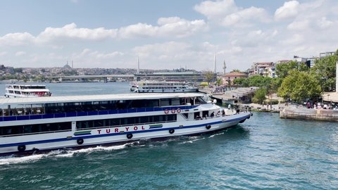 Istanbul, Turkey - August 22, 2021; Ferryboat sailing on the Bosphorus river towards the harbor in Istanbul
