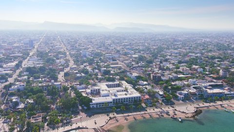 La Paz, Mexico: Aerial view of capital city of Baja California Sur, clear turquoise waters of Gulf of California, sunny day with blue sky - landscape panorama of North America from above