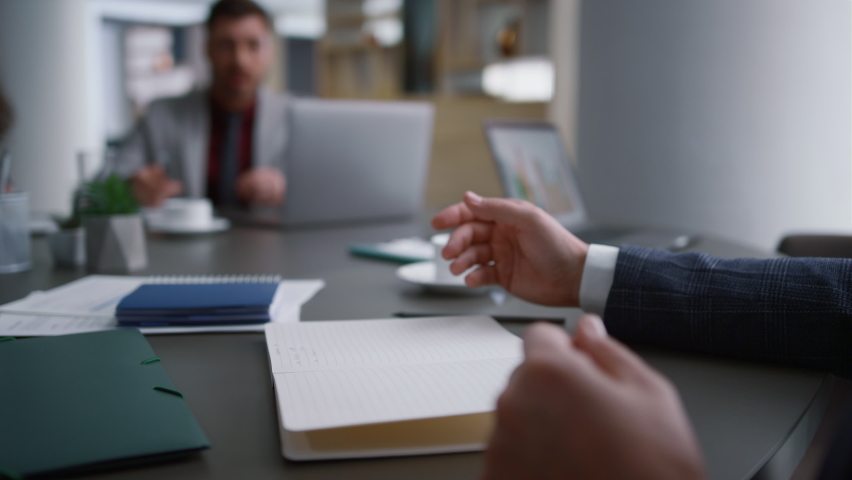 Business man hands writing filling paper document on office desk conference. Close up entrepreneur using holding pen working on meeting. Unknown executive salesman analyze report. Partnership concept Royalty-Free Stock Footage #1086791582