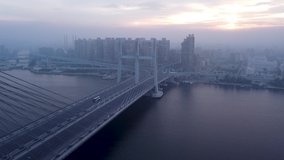 Drone video of the Tahya Misr bridge above the Nile and the Rod al-Farag axis at sunrise
