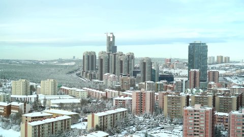 8K 4320p 7680x4320.Snowy cityscape of Ankara, the capital city of Turkey.High tall buildings and apartments.Cankaya district town.Metropolis urban skyscraper snow winter cold sunny weather centrum.8K.