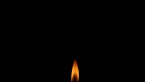 One candle burning brightly in the dark.  - Powered by Shutterstock - Get 15% off with code: PIKWIZARD15