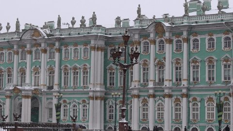 4K Footage, Snowfall on the background of the Hermitage in the center of St. Petersburg