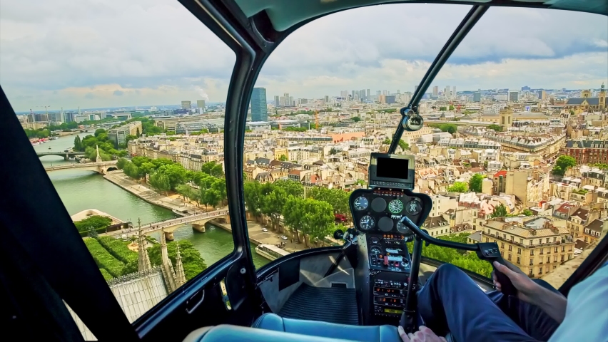 Helicopter flying on the roof of Notre Dame church spotting its spire, in Paris panorama, French capital, Europe. Scenic flight over Paris cityscape. Royalty-Free Stock Footage #1086845045
