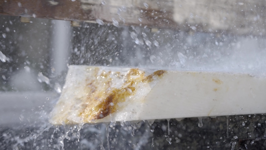 Macro Shot Of Makrana Marble Slab Being Cut With Water Spray In India. slow motion Royalty-Free Stock Footage #1086865499
