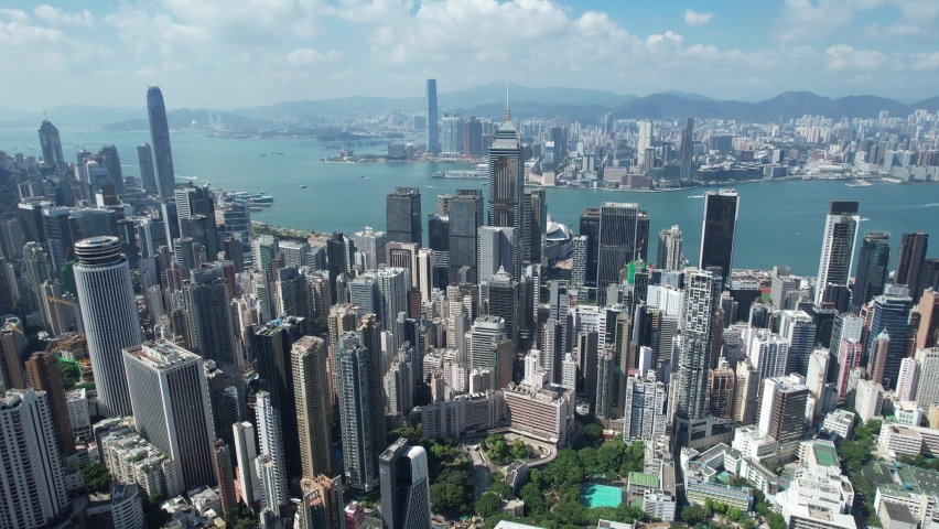 Aerial View of the skyline of Hong Kong at Victoria Harbour Financial Kowloon Central District Royalty-Free Stock Footage #1086867713