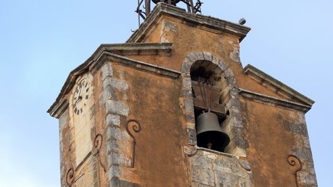 Belfry and clock tower of the village of Roussillon in Provence, France