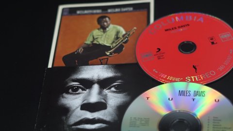 Rome, Italy - February 12, 2022, detail of two albums by Miles Davis, Tutu and Milestone blurred in the background.