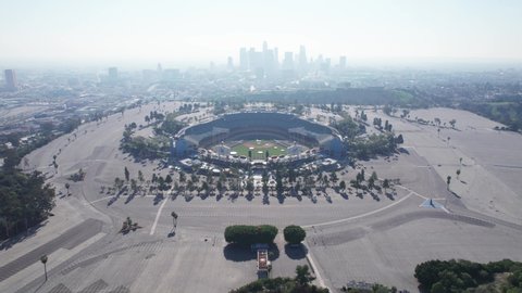 Los Angeles, FEB 2022. Dodger Stadium Los Angeles California with the Downtown LA and mountains view foggy, smog, Stadium Arena, home of LA Dodgers, Baseball stadium