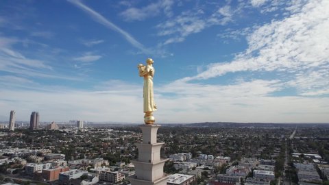Los Angeles, FEB 2022. Aerial view of Los Angeles California Temple Mormon Church of Jesus Christ of Latter-day Saints  with view on Downtown Beverly Hills