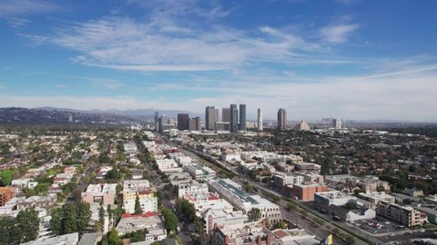 Los Angeles, FEB 2022. Aerial view of Los Angeles California Temple Mormon Church of Jesus Christ of Latter-day Saints  with view on Downtown Beverly Hills