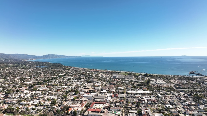 Flying Along the Santa Barbara, California Coastline and Ocean. Santa Barbara aerial view, flying with drone. Royalty-Free Stock Footage #1086901559