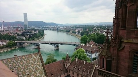 Timelapse of Basel City covering bridge, Rhine river, Switzerland from Munster