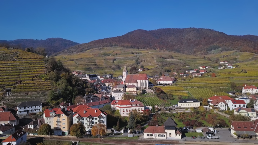 Aerial panorama of Spitz an der Donau town and vineyards. Wachau valley, Austria. 2.5x speeded up from 24 fps.