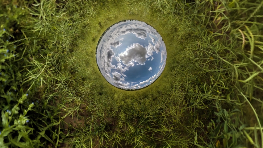 Abstract spinning of a tiny planet with transformation into a blue globe or sphere | Shutterstock HD Video #1086924581
