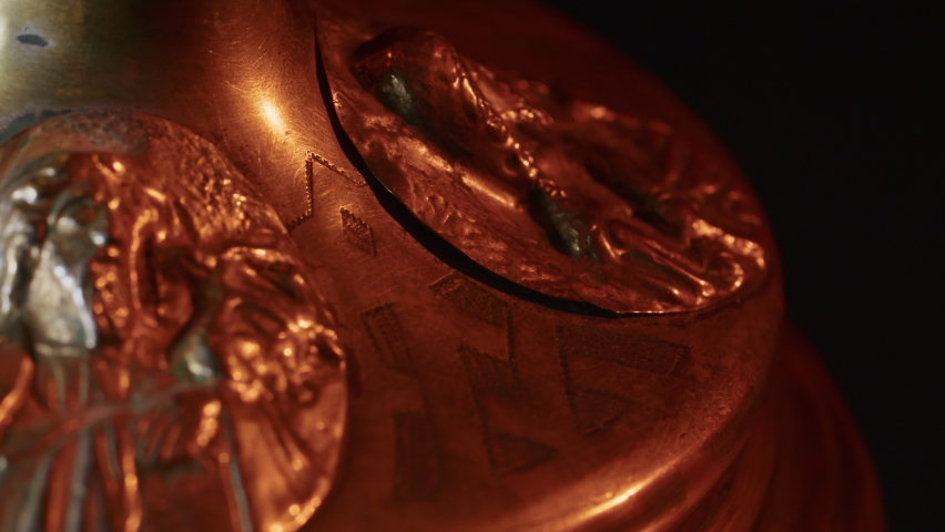 copper bowl for the Christian rite. found during excavations. vintage jewelry. religion. close-up