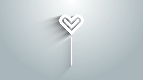 White Lollipop icon isolated on grey background. Food, delicious symbol. 4K Video motion graphic animation.