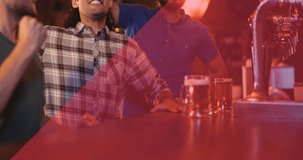 Animation of male american football player over happy diverse male sport fans watching game at bar. sport, competition, fans and friendship concept digitally generated video.