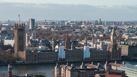 Establishing Aerial View Shot of London UK, United Kingdom, Palace of Westminster, British Parliament, long lens, close view, day sunny