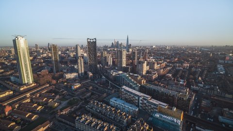 Establishing Aerial View Shot of London UK, United Kingdom, push in, golden light