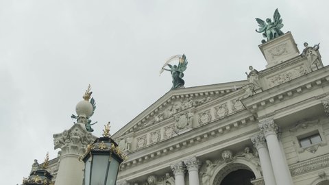 LVIV, UKRAINE - SEPTEMBER 22ND 2021: Slow tilt down the facade of Lviv Opera House in Ukraine