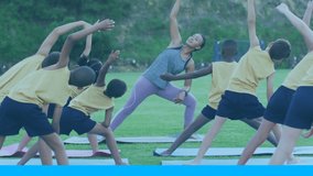 Animation of level up text over children with female fitness instructor stretching in park. sports and active lifestyle concept digitally generated video.