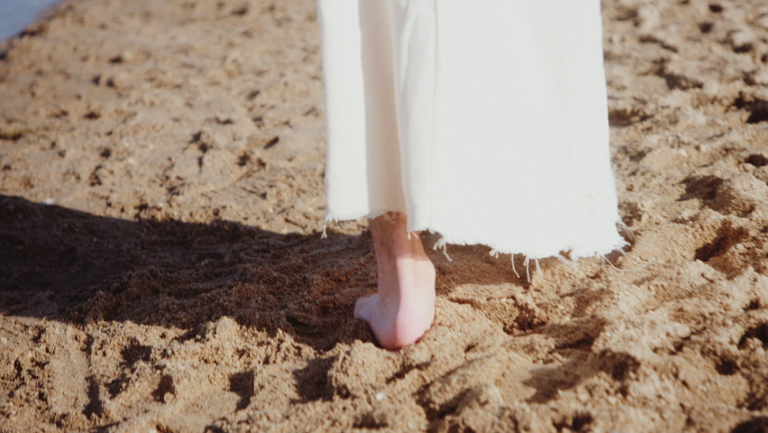 Closeup of Jesus walking on sand at Sea of Galilee - Shot on RED camera | Shutterstock HD Video #1086967679