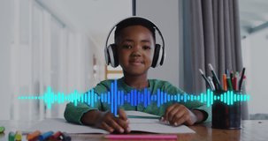 Animation of african american boy wearing headphones over light trails. education and school concept digitally generated video.